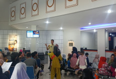 Dana PIP SD Cair : BRI Cabang Kayuagung Dipadati Siswa dan Wali Murid