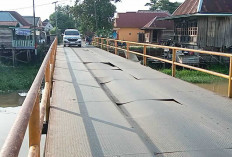 Warga Ogan Ilir Keluhkan Turunnya Jalan Akibat Sungai Ogan dan Rusaknya Jembatan 