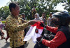 Semarak HUT RI ke-79, Pemkab OKI Bagikan 1.500 Bendera Merah Putih