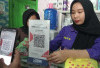 Belanja Praktis, Pakai QRIS : NKHZ Baby Shop Tumbuh bersama QR Code BRI